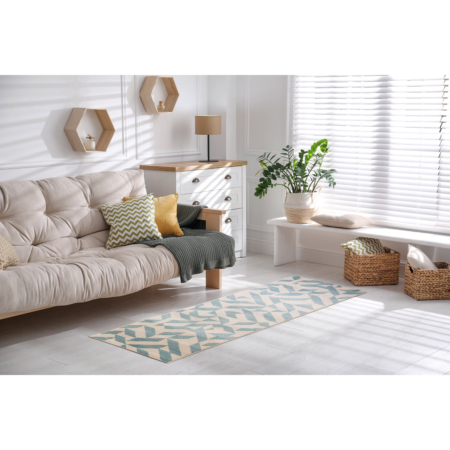 Stylish rug with dots on floor in living room
